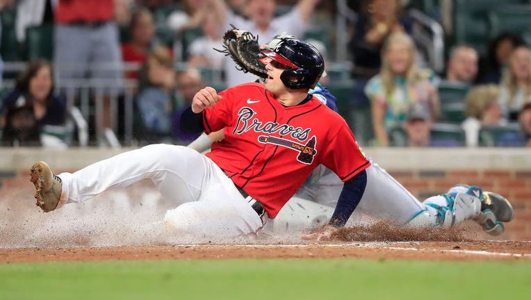 Braves avoid series loss with 6-5 win in Texas