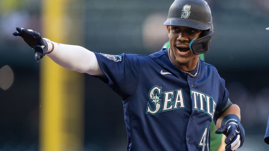 Julio Rodriguez of the Seattle Mariners celebrates with the team's News  Photo - Getty Images