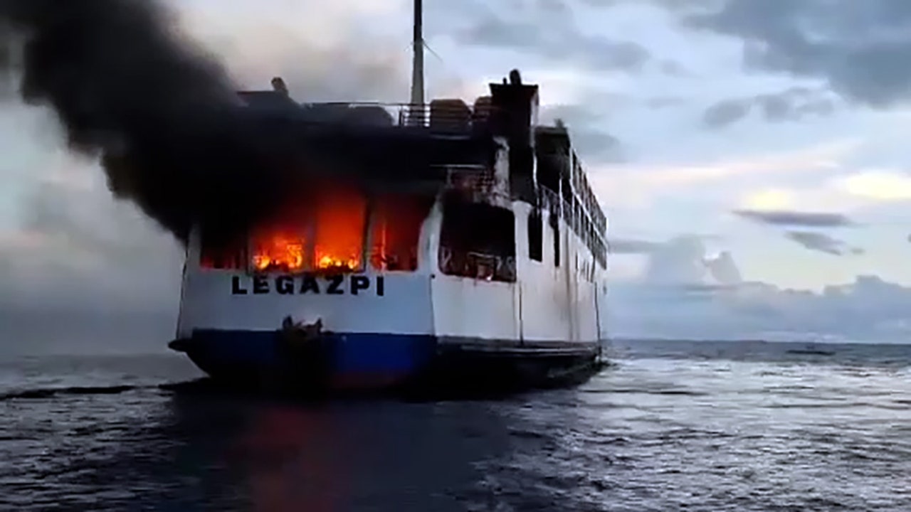 Video shows ferry on fire at sea; 120 people rescued
