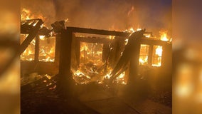 Crews battle massive house fire on Snag Island