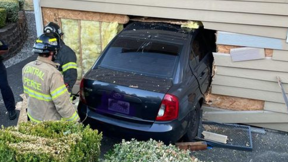 Suspected DUI driver crashes into Puyallup home; resident hit inside