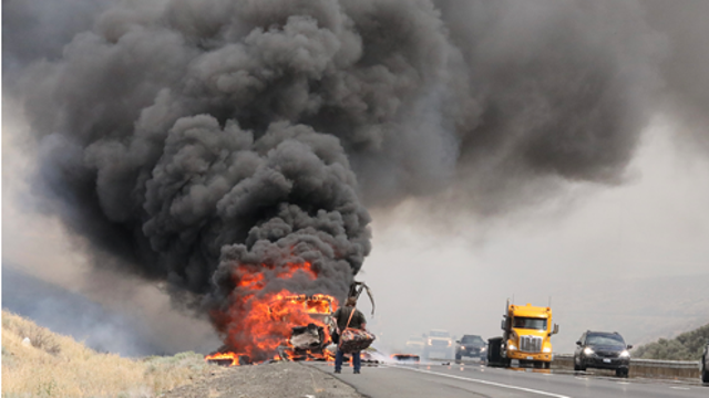 Brush fire closed I-90 west of Vantage Bridge, caused by burning semi-truck