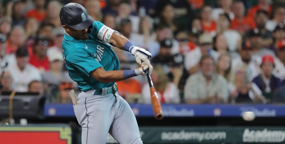 Moore homers twice and Rodriguez sets hits record as Mariners rout Astros