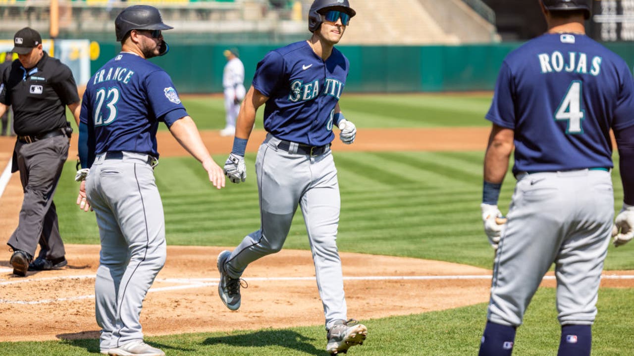 Rangers rally in 9th again to beat A's 8-5 for 3rd in row