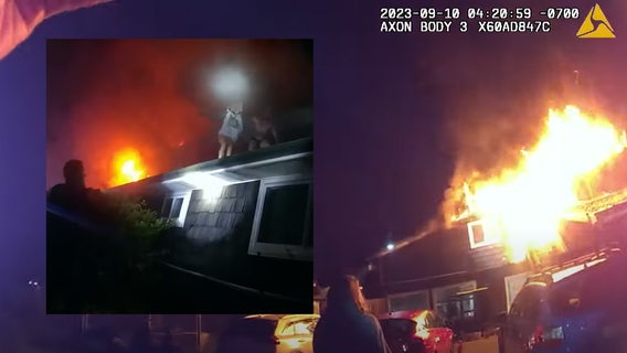 WATCH: Officers sprint toward burning house to rescue family in Algona