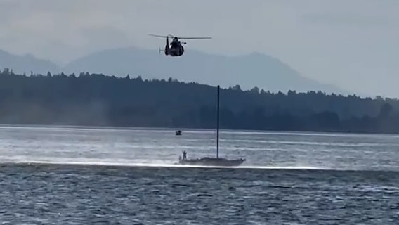 VIDEO: Man and dog rescued from vessel stranded in Samish Bay