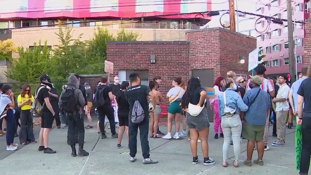 'We want to keep these people accountable:' Protesters march for woman hit and killed by SPD officer