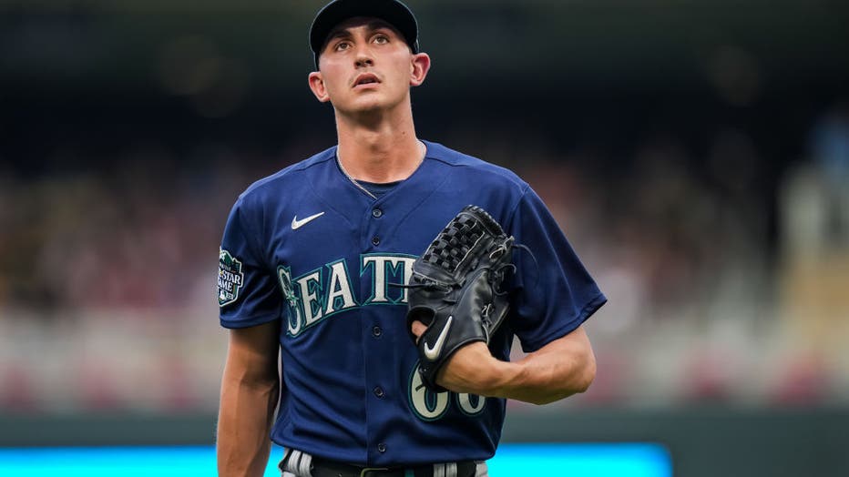 Seattle Mariners' George Kirby looks on during a baseball game
