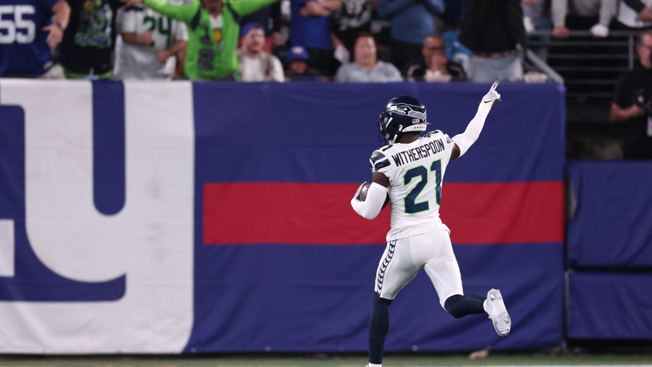 Jake Bobo of the Seattle Seahawks scores a touchdown during the News  Photo - Getty Images