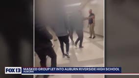 Cell video shows chaos erupt at Auburn Riverside High School as masked kids run the halls, hitting students