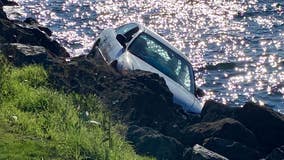 Crews rescue two after crashing their car near the water at Golden Gardens