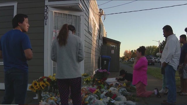 Memorial grows outside store where Tacoma shop owner was killed