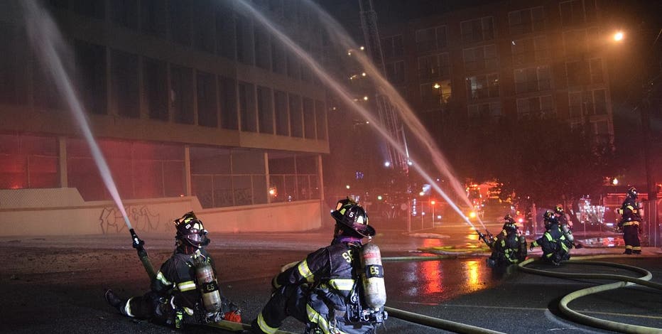 Vacant building in Lower Queen Anne catches fire, Seattle Fire Investigating