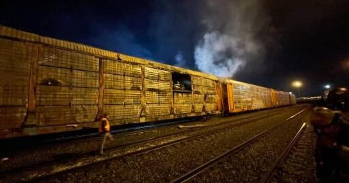 Train car full of vehicles catches on fire in Tacoma | FOX 13 Seattle