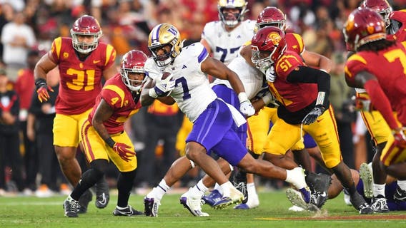 Dillon Johnson runs for 256 yards, 4 TDs in No. 5 Washington’s high-octane 52-42 win over No. 24 USC