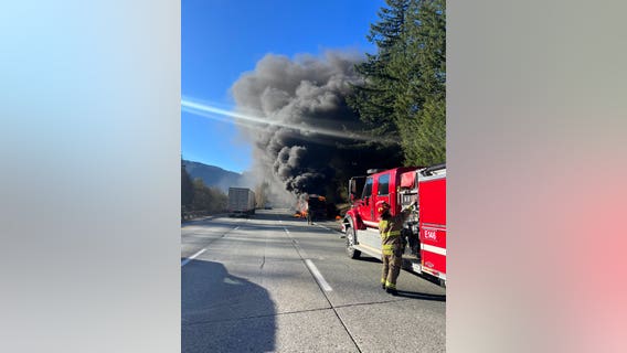 VIDEO: Bus catches fire on I-90 in Washington, 17 people escape unharmed