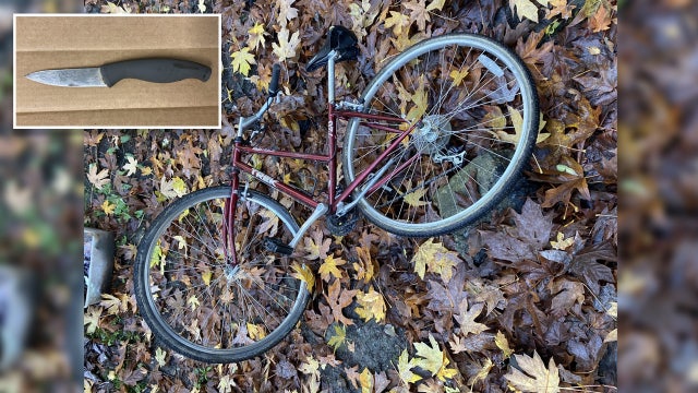 Seattle PD: Suspect tried to stab man while riding on bike