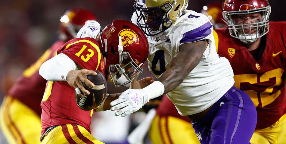 Zion Tupuola-Fetui made one of the biggest plays for No. 5 Washington with a heavy heart