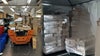 Overwhelmed with Amazon packages, San Juans post office sets up tents outside