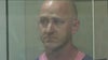 Off-duty pilot indicted after allegedly trying to shut down plane's engines