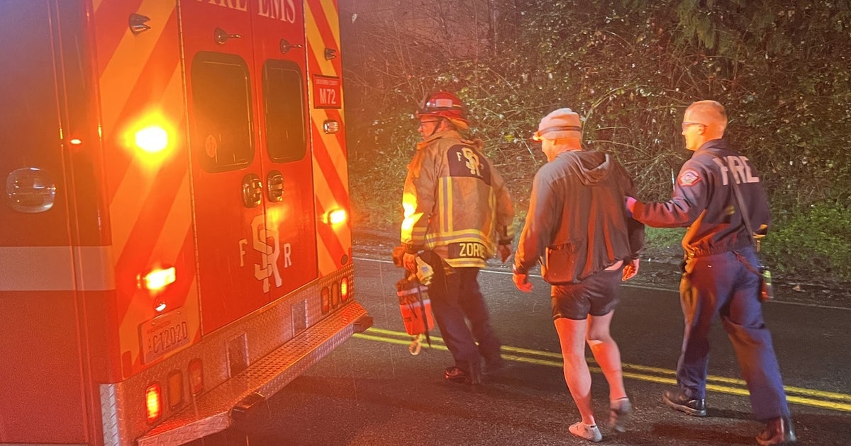 PHOTOS: Man in small boat saved from raging Skykomish River in daring ...