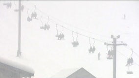Skiers and boarders greeted by heavy snow during Snoqualmie Pass' opening day