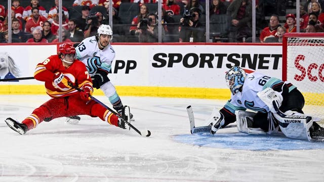 Alex Wennberg scores game-winner, Chris Driedger makes 37 saves in Kraken’s 2-1 win over Flames