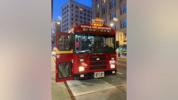 Seattle Firefighters use big red bus to save people from the cold