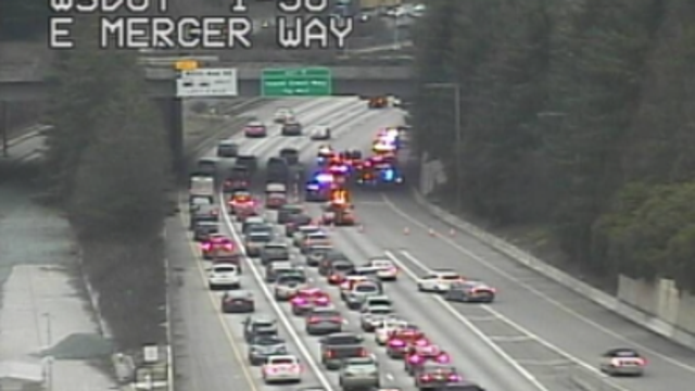 Pursuit of bank robbery suspect ends with arrests on I-90