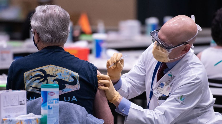 person gets a shot photo