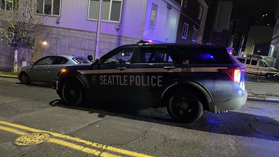 Woman killed in Belltown shooting, suspect in custody
