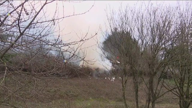 'We had to jump over the flames': Woman describes escaping encampment fire near I-5