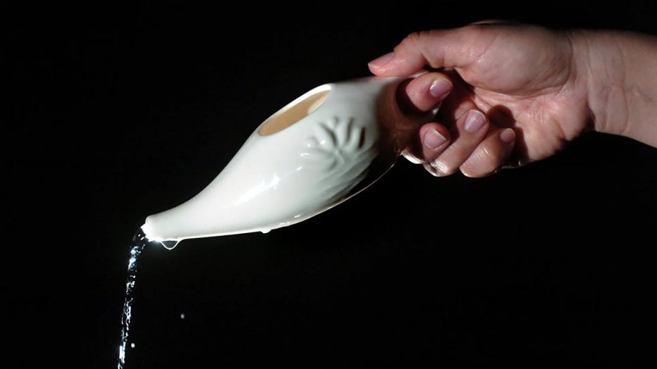FILE - A neti pot used for nasal irrigation. (Photo by Tom Sumlin/Charlotte Observer/Tribune News Service via Getty Images)