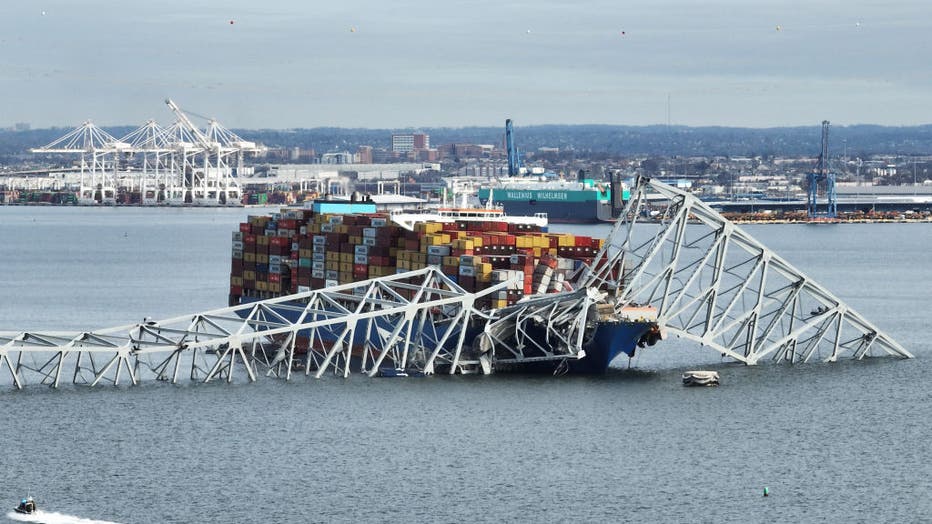 cargo ship slams into bridge