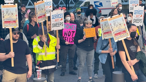 'Don’t turn us into criminals:' Unhoused people, advocates rally outside federal Seattle courthouse