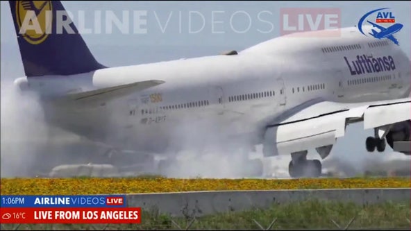 Boeing 747 carrying 345 people bounces on LAX runway during hard landing, video shows