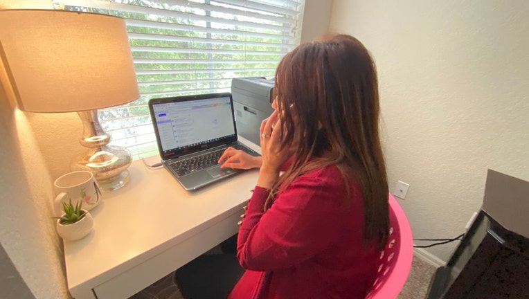 woman using internet on computer