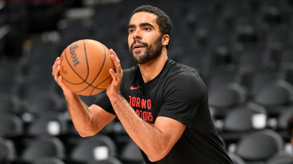 jontay porter shooting a basketball