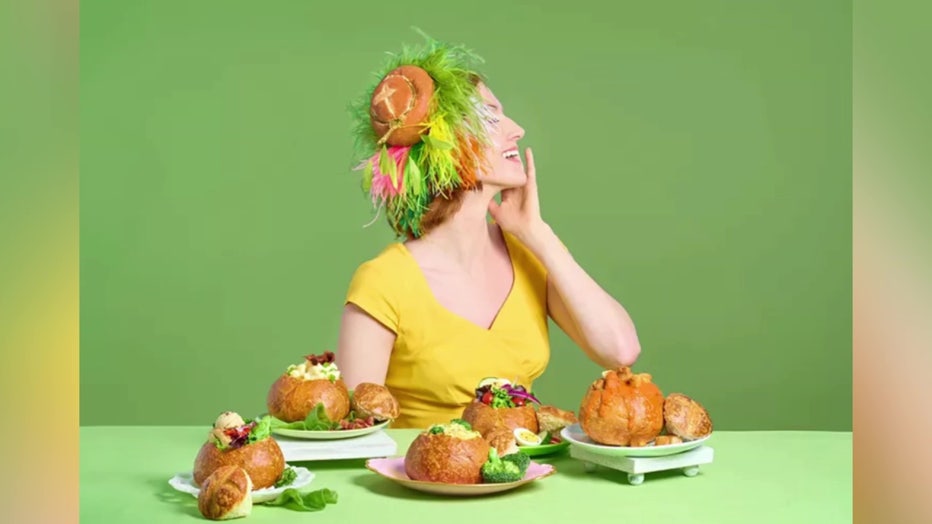 woman wearing bread hat