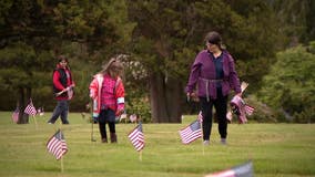 Volunteers place 4,400 flags on graves of veterans in Lynnwood ahead of Memorial Day