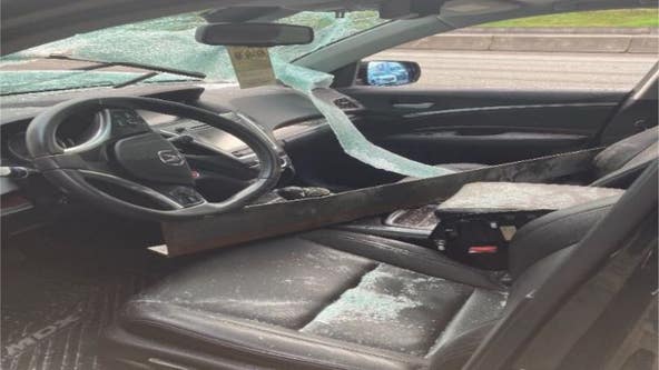 Steel beam thrown from Lynnwood overpass crashes through car