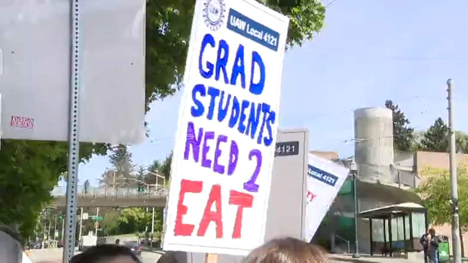 picket sign at uw student worker strike