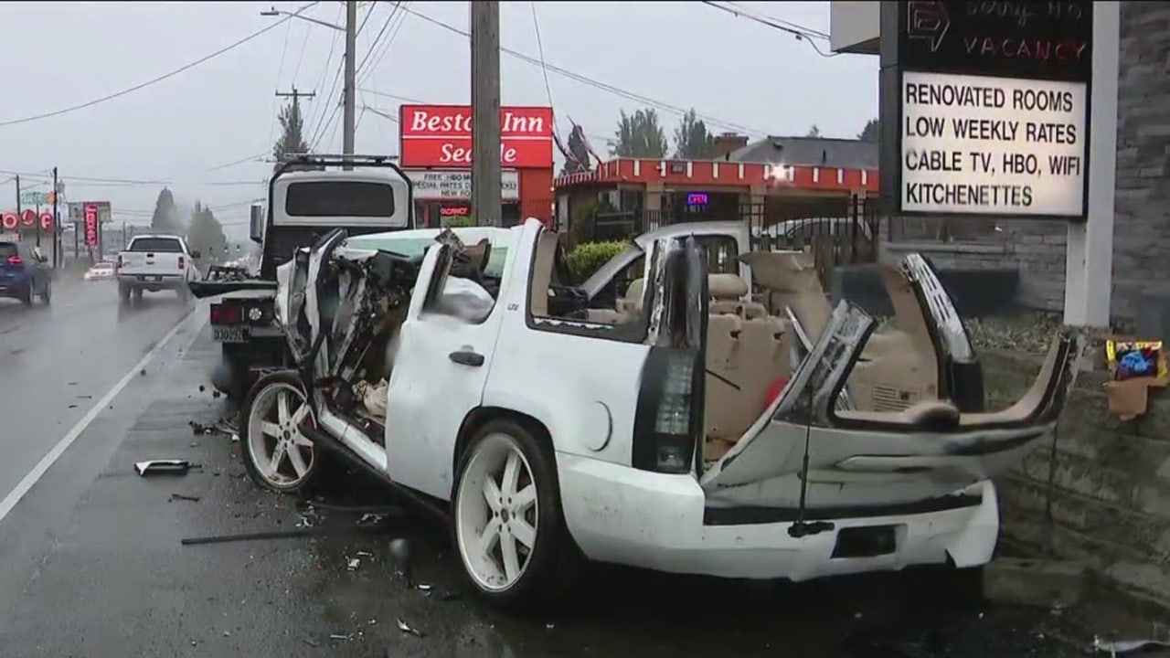 Firefighters rescue driver after North Seattle car crash