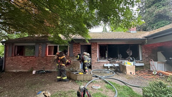 Man dies, woman hospitalized after being rescued from Edmonds house fire