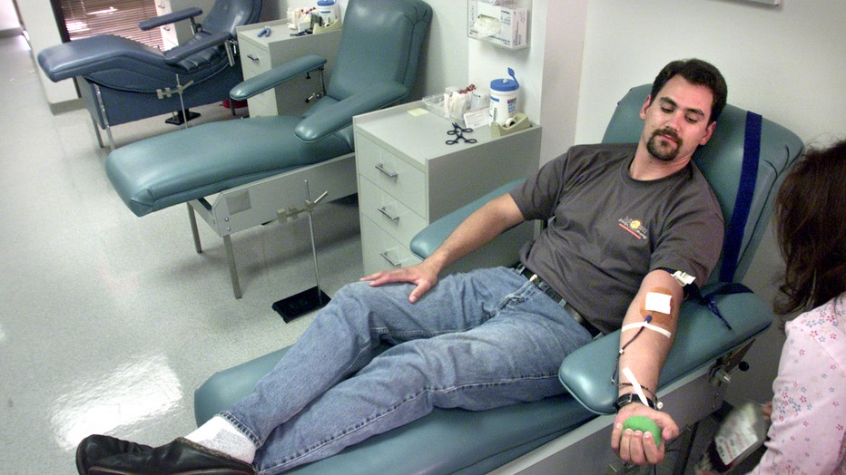 man donating blood