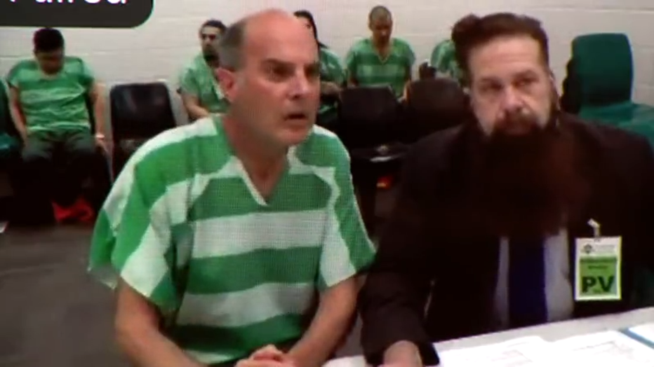 giles stanton in court with attorney