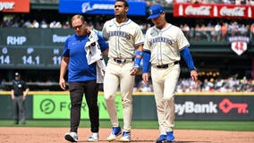 Seattle Mariners star Julio Rodríguez leaves game with injury after collision with wall