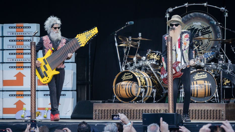 elwood francis and billy gibbons of zz top perform live on stage