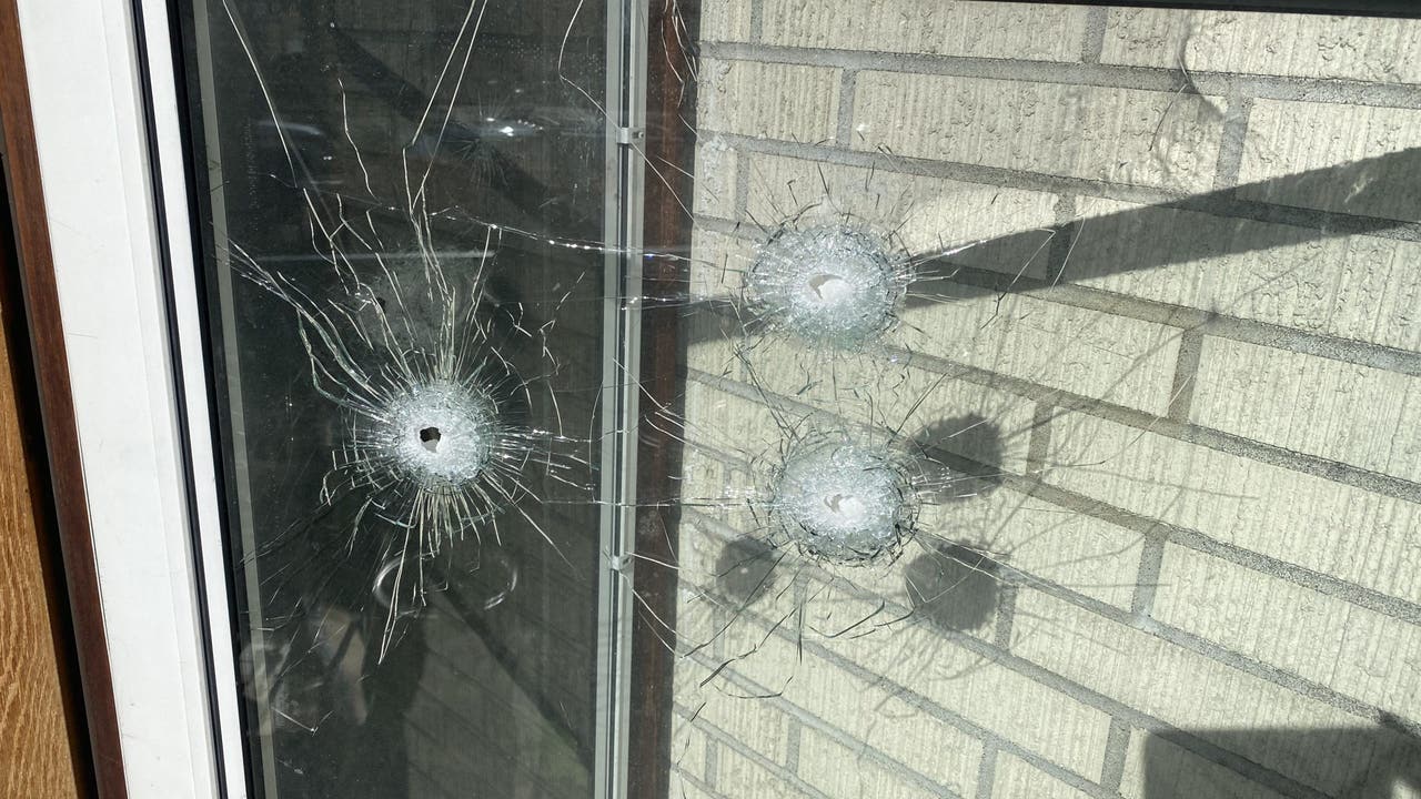 Family says gunmen fired 60 to 70 shots at Burien home