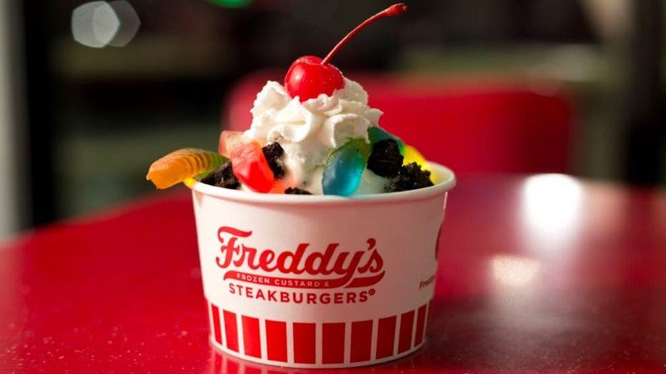 frozen custard sundae with whip cream and cherry